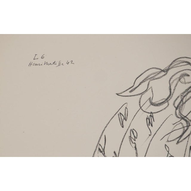 Henri MATISSE (1869-1954) Young woman playing with her charm, 1943 Lithograph after a drawing by the artist (Fabiani...