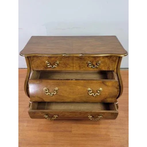 Vintage French Louis XV Style Revival Bombe Chest with Gilt Brass Hardware by Baker Furniture Vintage Baker Furniture...