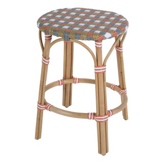 Ballito 24.5 in. Seat Height Oval Rattan Counter Stool with Footrest, French Orange, Brown, Gray & White For Sale