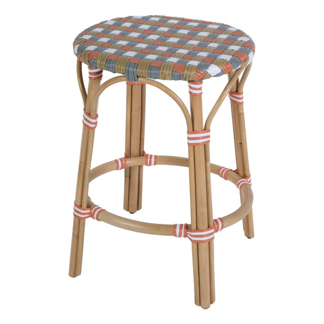 Ballito 24.5 in. Seat Height Oval Rattan Counter Stool with Footrest, French Orange, Brown, Gray & White For Sale
