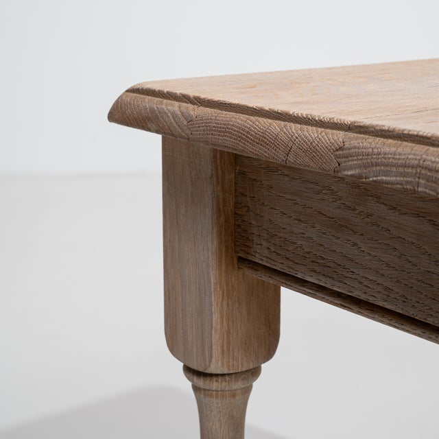 Crafted in France during the 1970s, this distinguished set of three oak nesting tables exemplifies the refined...
