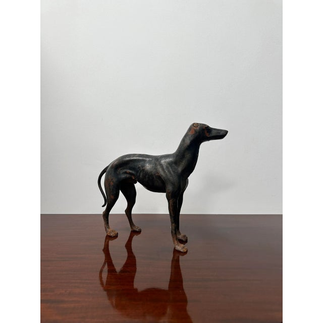 - A cast iron bronze model of the Whippet, England circa 1950. - The Whippet, renowned for its speed and agility is...