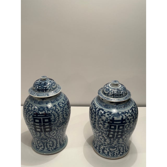 Timeless blue and white antique Chinese lidded wedding jars that make elegant accessories.