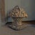 This antique cast iron multi flower basket doorstop is a unique and charming collectible from the United States. Crafted...