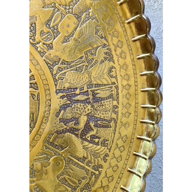Brass Mid 20th-Century Persian Qajar-Inspired Design Brass Chased & Repoussé Charger Tray Top Accent or Coffee Table For Sale - Image 8 of 17