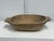 Design Plus Gallery presents a Vintage Handcrafted Wood Dough Bowl. This elongated bowl is formed from a solid section of...