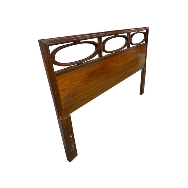 Elevate your bedroom with this striking mid-century modern walnut full-size headboard, crafted in the 1960s. Featuring a...