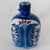 1950s Danish faience ceramic bottle by artist Marianne Johansson for Aluminia. The bottle has been finished in blue, green...