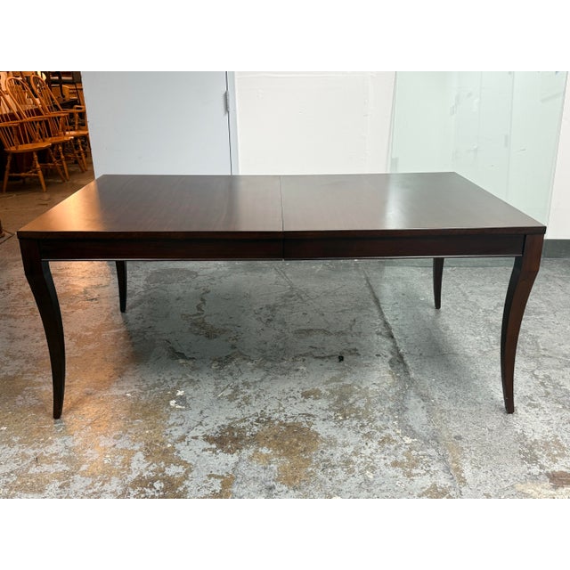Design Plus Gallery presents a Barrymore Extension Dining Table by Ethan Allen. This rectangular dining table showcases a...