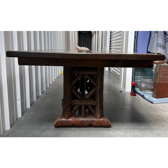 With plenty of room for all, this Rustic Trestle Dining Table is a friendly centerpiece for entertaining. Featuring a base...