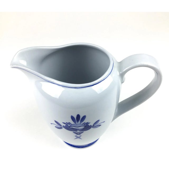 Vintage Arabia of Finland individual teapot or water pitcher in the Blue Rose pattern. The body of the pot or vase is...