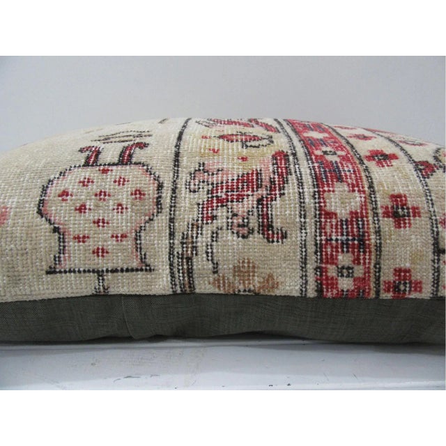 This is a pillow cover made from a vintage kilim rug. The piece was properly washed and ready to use. Pillow inserts not...