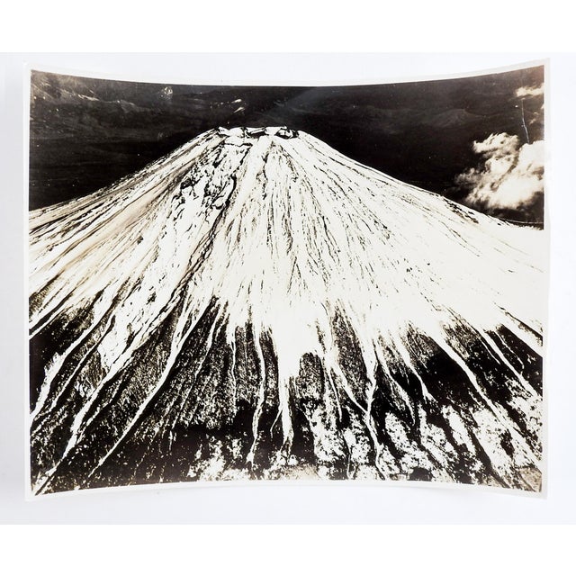 Mid 20th century glossy black and white aerial photograph of Mt. Fuji Japan. Unsigned. Unframed, slight curl to photo.