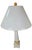 A striking pair of wooden obelisk table lamps by The Natural Light Company of Panama City, Florida. Each lamp is built...