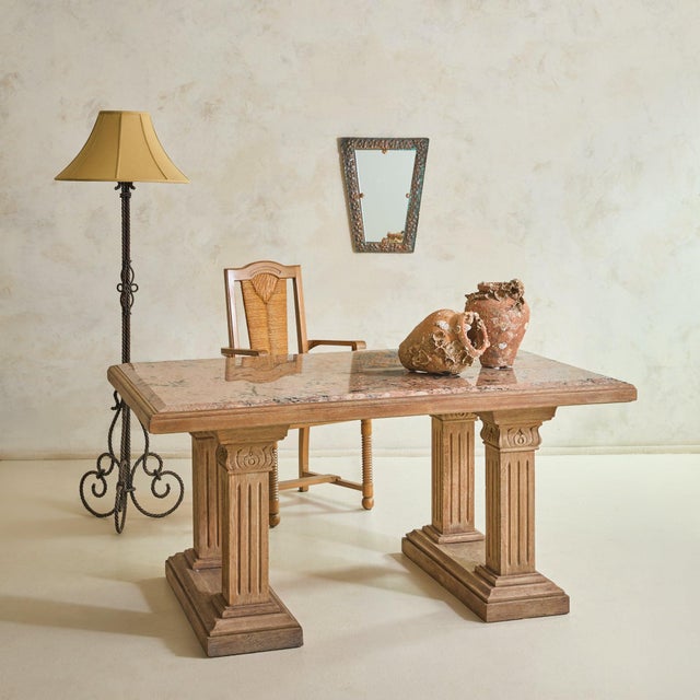 A French Neoclassical Revival desk from the 1940s, composed with a sense of permanence more often associated with...