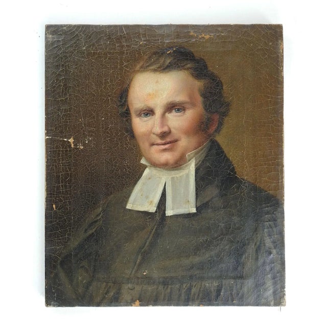 Mid 19th century oil on canvas portrait painting. Handsome blue eyed clergyman in robe and fall collar. Unsigned....