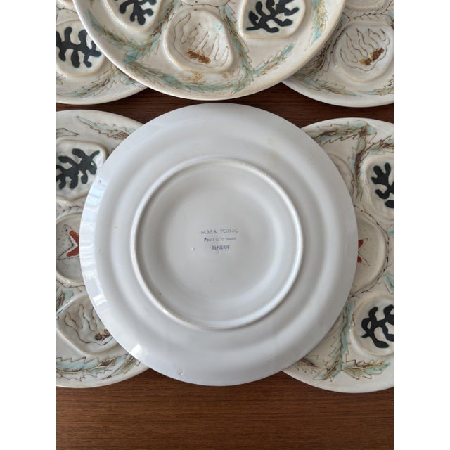 Discover this magnificent set of 6 hand-painted earthenware oyster plates with a coastal design. These plates evoke the...