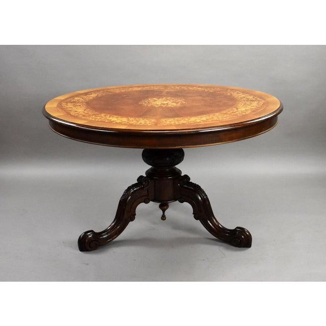 Victorian burr walnut marquetry centre table item code: lc1457 a highly decorative victorian burr walnut and marquetry...