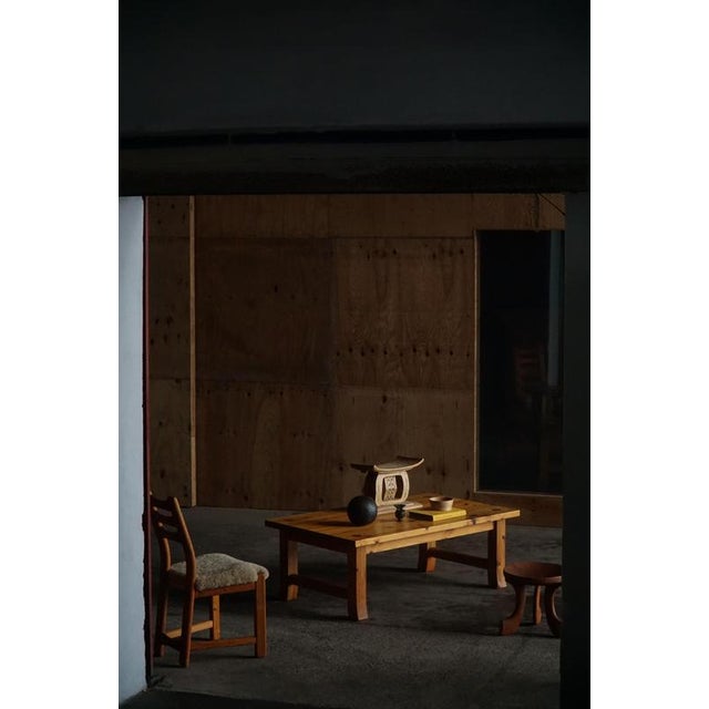 A beautifully crafted mid-century swedish solid pine coffee table, executed with simple yet striking proportions and the...