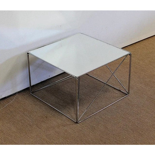 Small coffee table with geometric lines and design, designed in 1970 by the French-Algerian metal craftsman, Max Sauze...