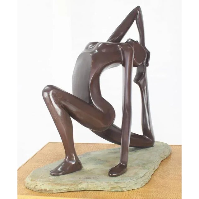 Mid-Century Modern deco abstract sculpture of female nude gymnast. Coppered or bronzed composition.
