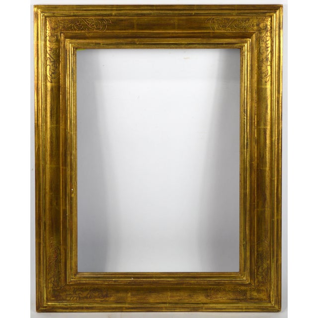A very fine pierced / scraffito detailed giltwood frame. The frame is an excellent example of a contemporary production of...