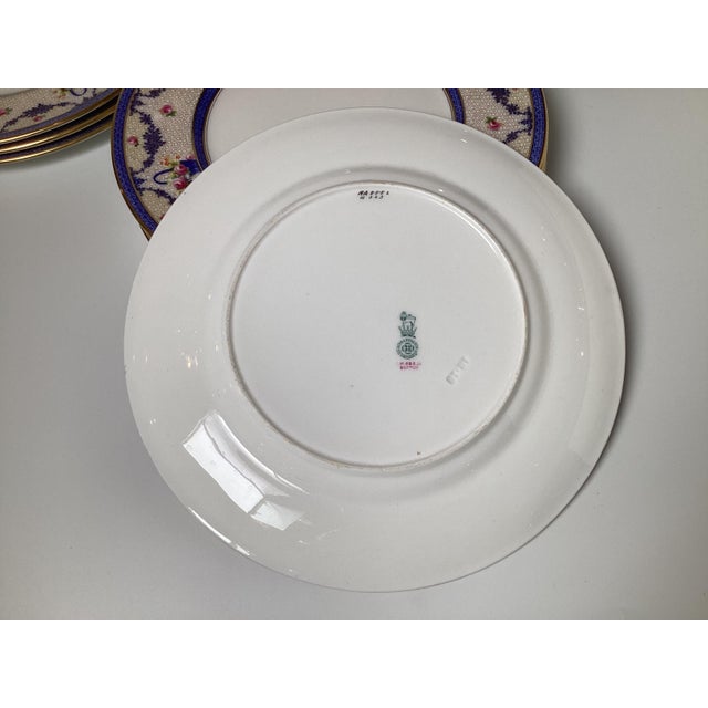 A set of twelve dinner plates by Royal Doulton, a renowned English ceramic mfg. For Sale - Image 4 of 9