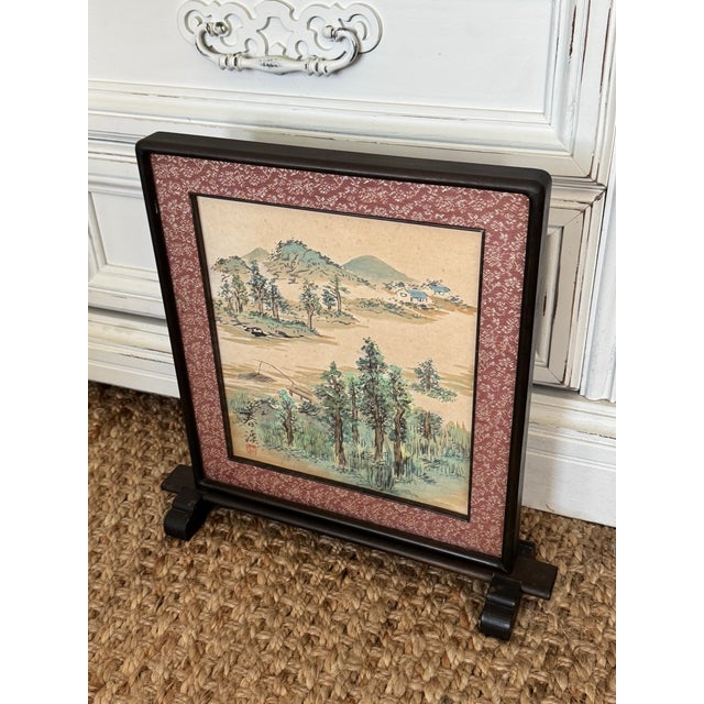Beautiful Asian tabletop or desk screen featuring a traditional landscape painting inspired by classic East Asian scenery....