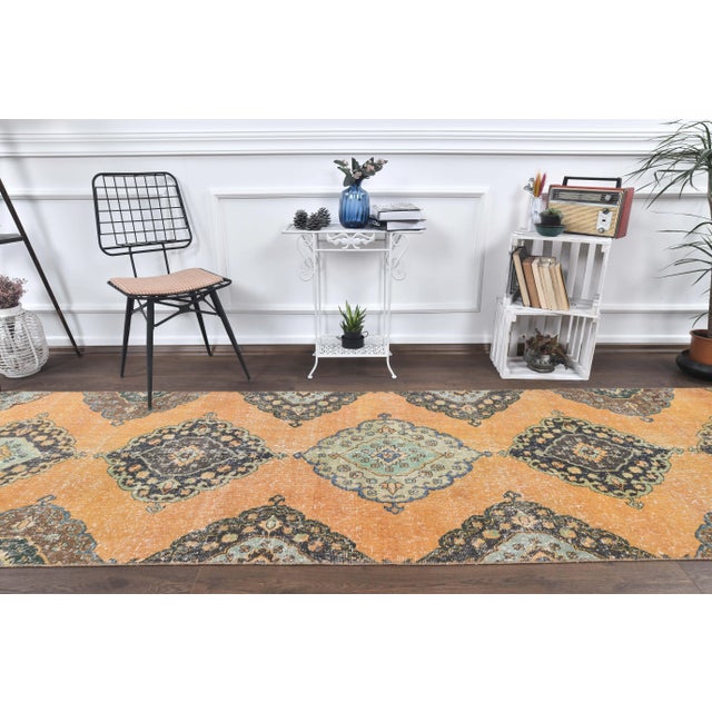 Vintage Turkish Hand-Knotted Oriental Runner Rug is a semi-Vintage rug. '60s Eastern region of Turkey's unique rug is...