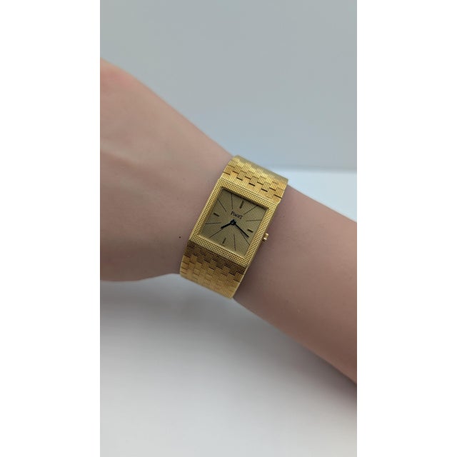 The Piaget Gold Watch is a luxurious timepiece that exudes elegance and sophistication. Crafted from 18K gold, this watch...