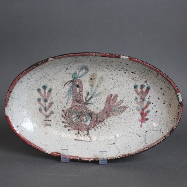 Mid-century French ceramic tray by Gustave Reynaud for Le Mûrier (circa 1960s). Oblong-shaped tray in rustic Provençal...