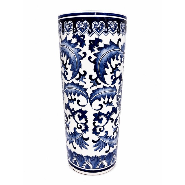 Classic vintage porcelain umbrella stand featuring a clean cylindrical silhouette and versatile white finish. Crafted of...