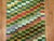 A narrow and long Vintage Turkish Deco runner with a thick pile all over colorful, bright checkerboard motif. Measures:...