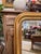 This is a beautiful mid sized gold leafed C. 1880 Louis Philippe mirror! This mirror holds to a simple quiet design...