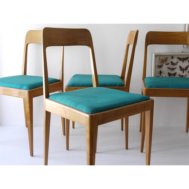 A matching set of four comfortable and elegant Austrian modernist dining room or side chairs. Model no. A7, designed and...