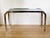 Beautiful Postmodern Chrome and Smoke Mirror Console in Style of Leon Rosen for Pace or Mil Baughman. The chamfered...