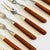 Mid 20th Century Mid Century Modern Stainless Steel With Wood Handles Cocktail Forks - Set of 9 For Sale - Image 4 of 6