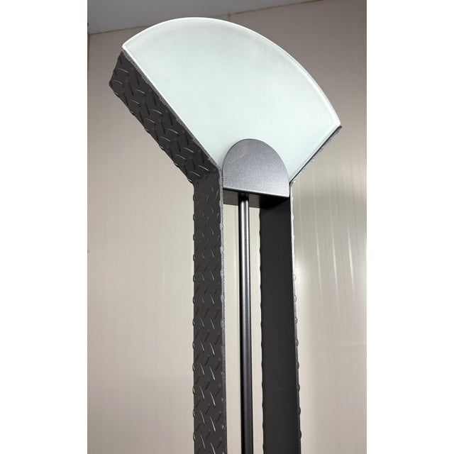 Unusual floor lamp, Italy. Foot and three-pice stem in black steel tear plate, white glass lamp shade. Halogen, switch...