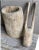 Primitive mortar and pestle. Embedded blades and nails in the pestle for chopping, 29# measurement from top of pestle to...