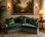A stunning Baker Furniture corner conversation sofa upholstered in sumptuous crushed emerald green velvet. The serpentine...
