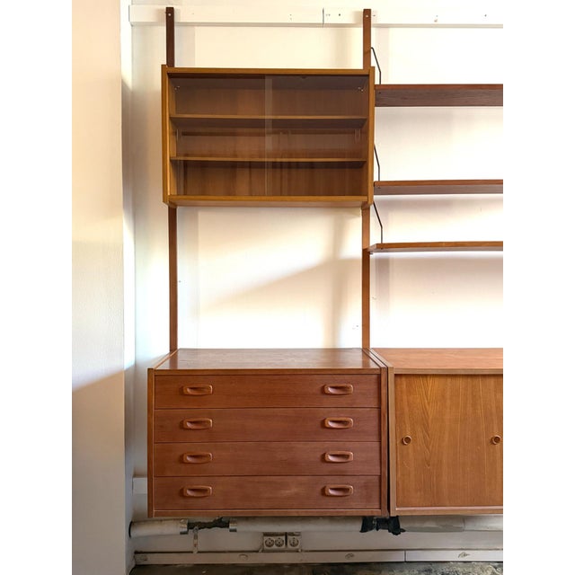 Preben sørensen modular teak wall unit – ps system denmark, 1960s a striking and versatile danish wall unit designed by...
