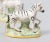 A superb pair of antique English Staffordshire zebra figurines, circa 1920. These charming zebras are hand painted with...