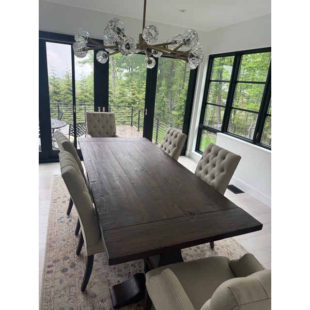 Exceptional Restoration Hardware Salvaged Wood Trestle Rectangle Extension Dining Set in excellent condition. This elegant...