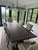 Exceptional Restoration Hardware Salvaged Wood Trestle Rectangle Extension Dining Set in excellent condition. This elegant...