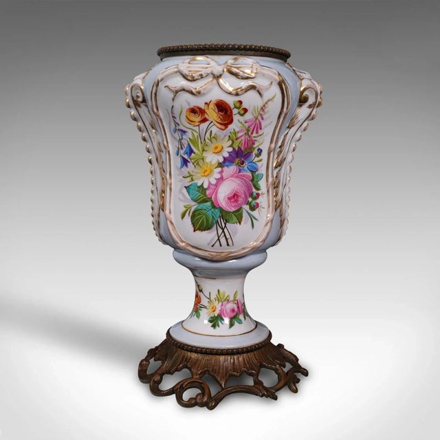 This is an antique mantlepiece vase. A French, ceramic and gilt metal display planter or jardiniere, dating to the late...