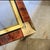 80s modern brass and faux tortoise square coffee table! Smoky glass inset trimmed in brass. Legs have a combo of brass and...