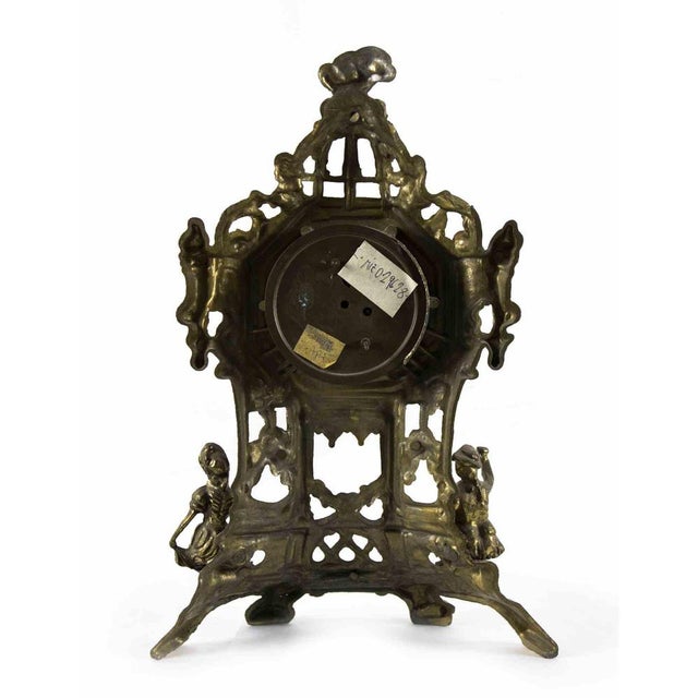 Vintage clock is an original object realized in the early 20th century. Original brass and glass. Made in Germany....