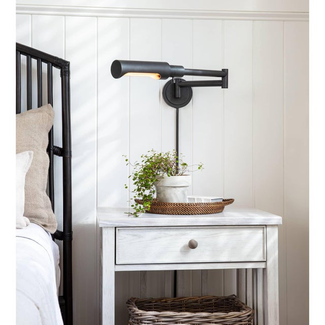 With its multiple pivoting joints and versatile pin-up or hardwire construction, the Noble Swing Arm Sconce is designed...
