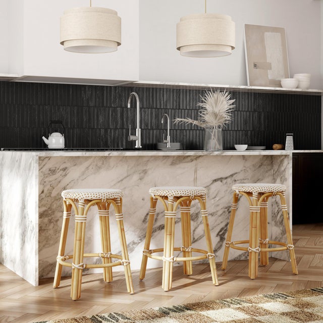 Evoking images of sidewalk tables in the Cote d'Azur, counter stools like this will give your kitchen or patio the casual...