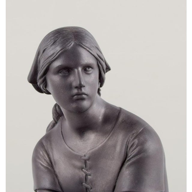 L. Hjorth, Bornholm. Figure of Joan of Arc in black terracotta. Model number 597. Circa 1900. Marked. In excellent...